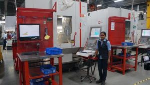 Woman working on Hermle